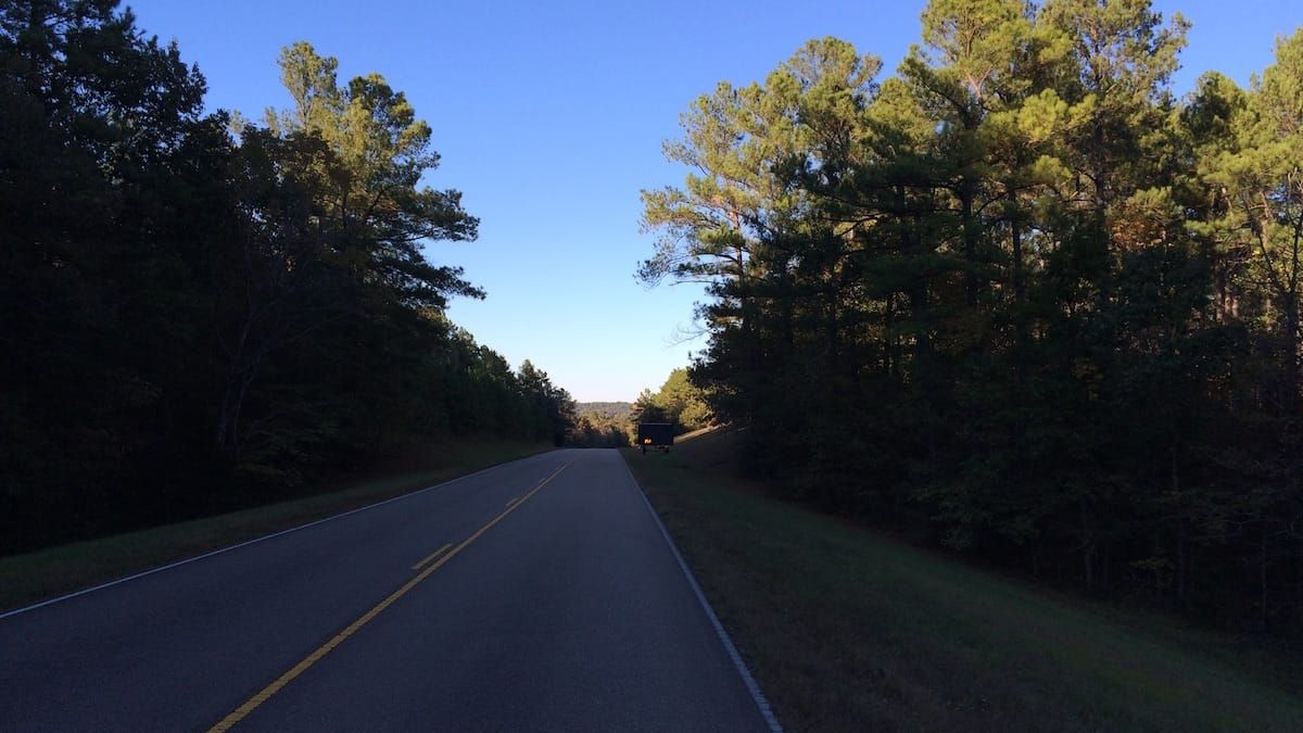 Road closed and detour signs.