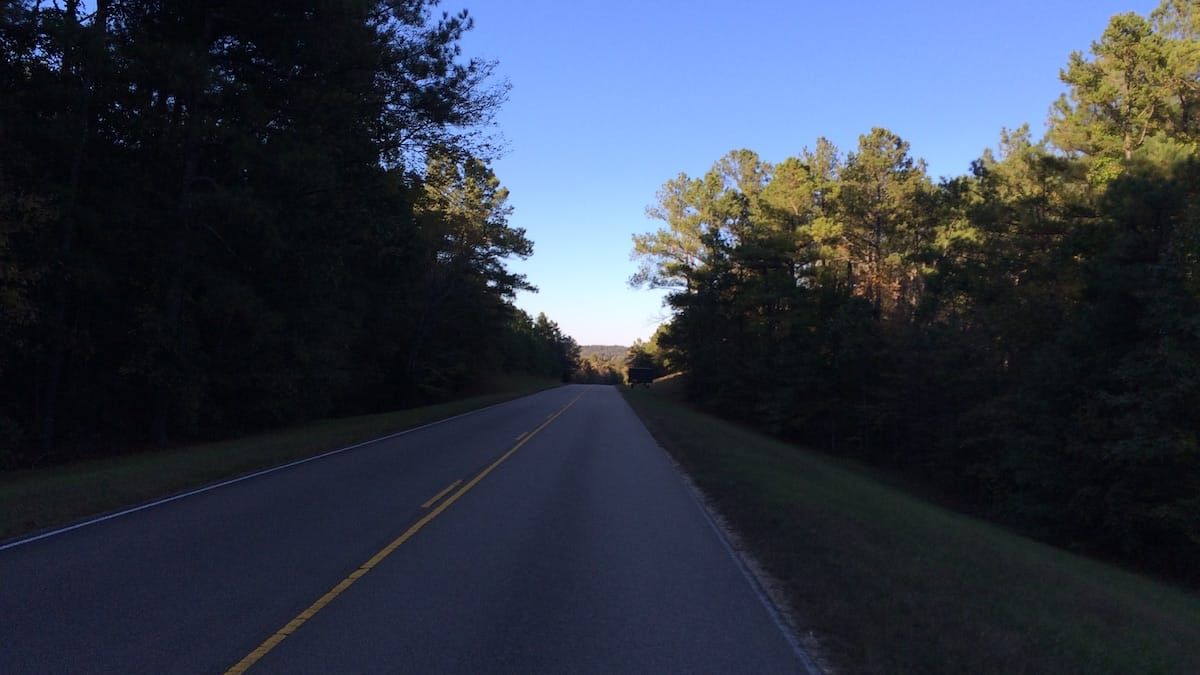 Road closed and detour signs.