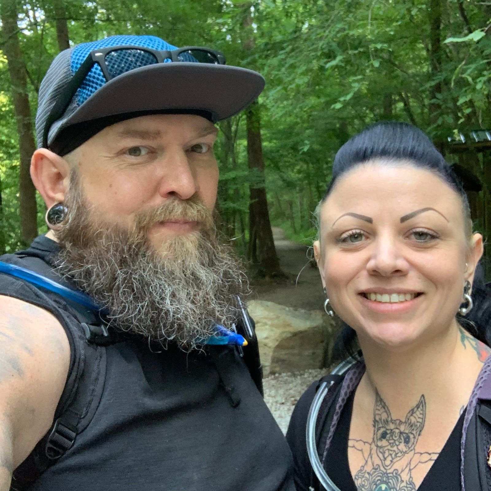 A selfie with smiling Mikd and Meredith, looking fresh before starting our hike.