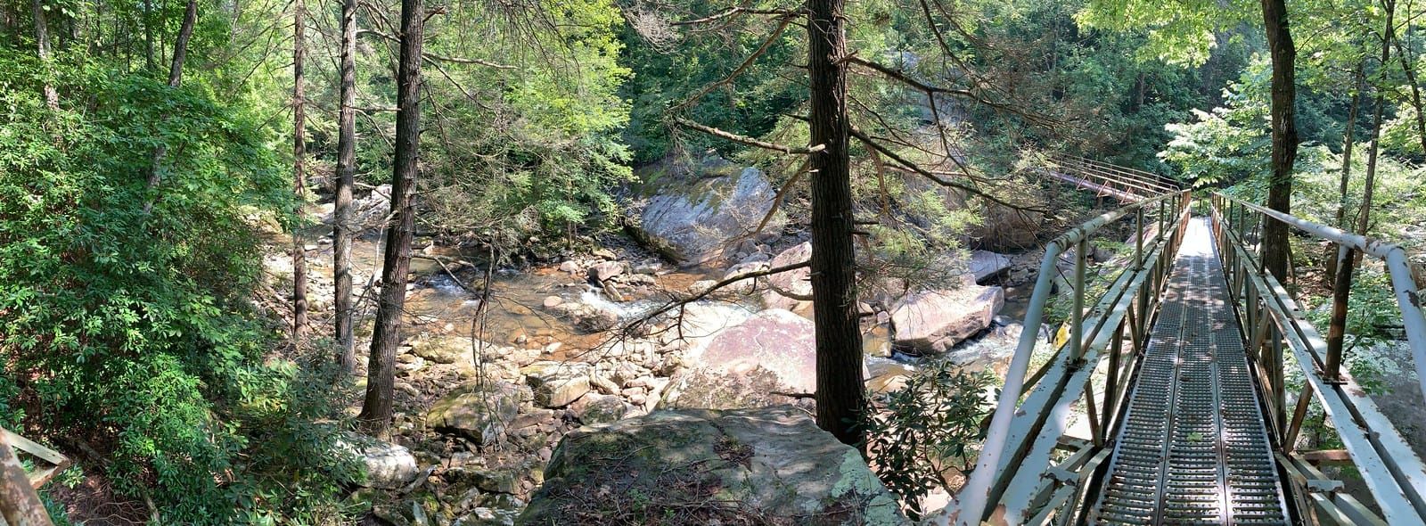 A panoramic view of the metal bridge spanning Richland Creek from the other side.