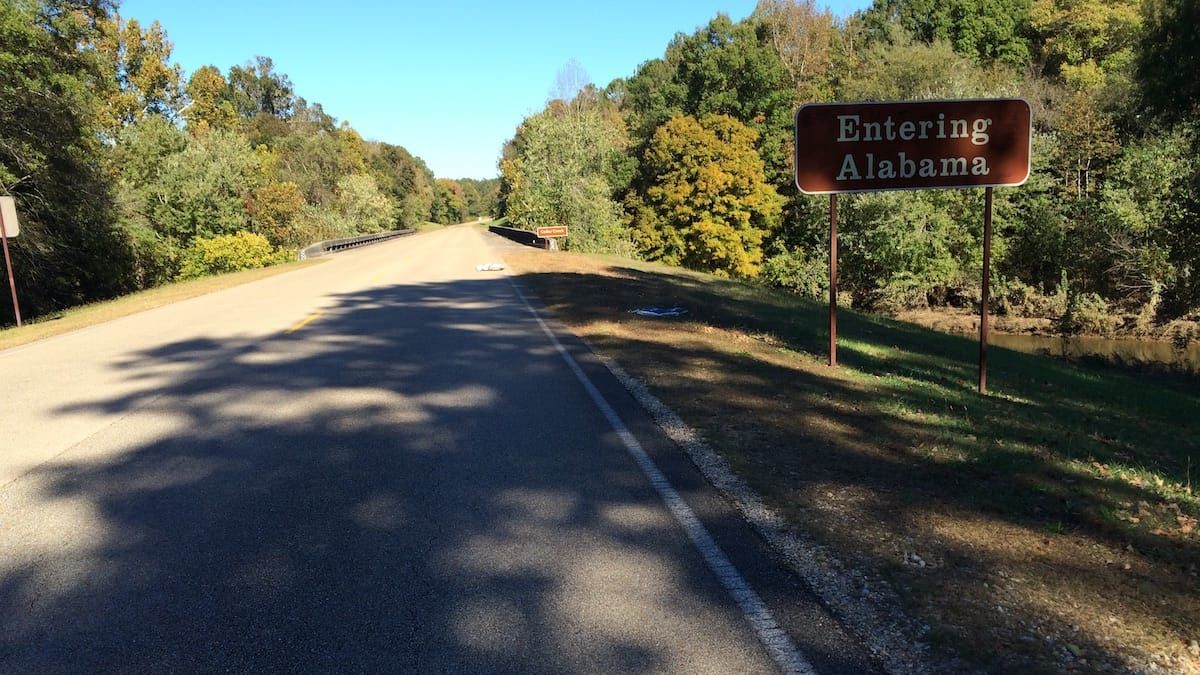 Road closed and detour signs.