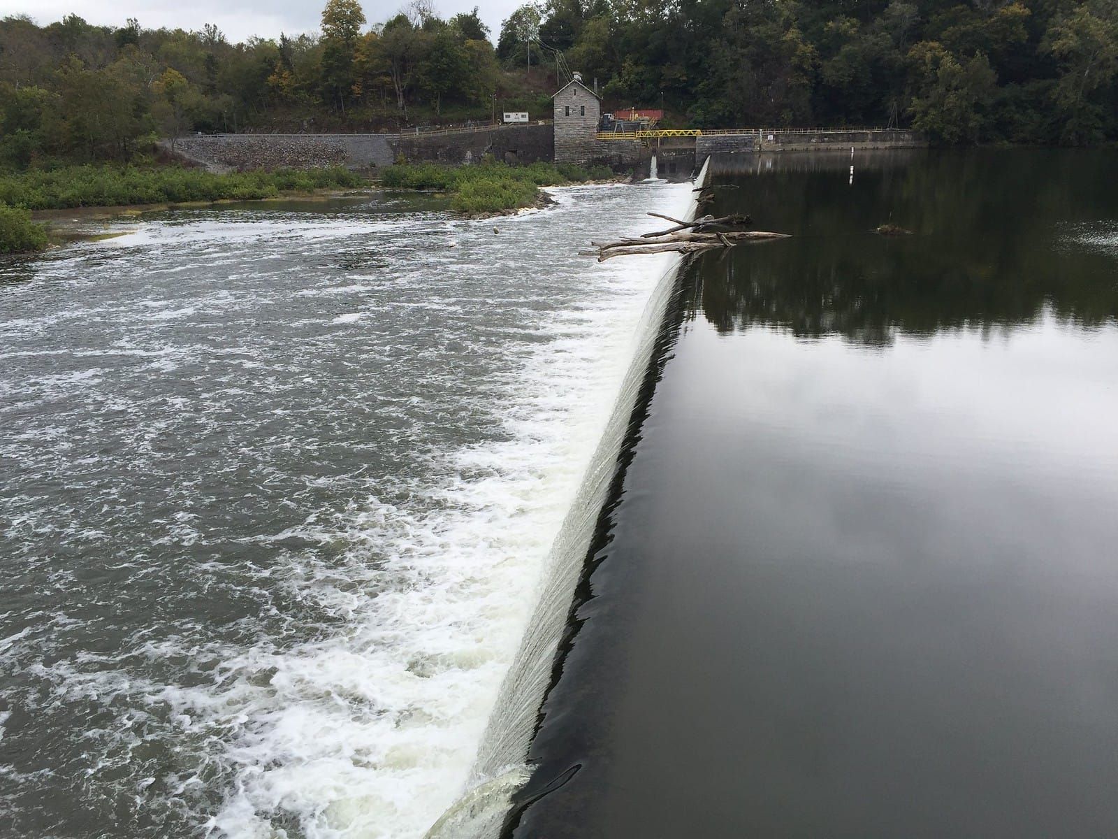 River going over a small dam of about 8 feet.