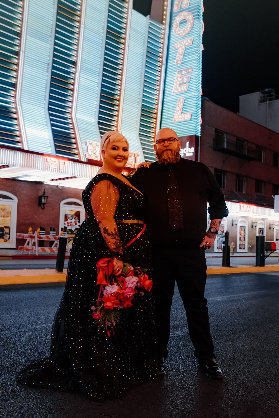 Mike and Rachelle posing for a photo in downtown vegas.