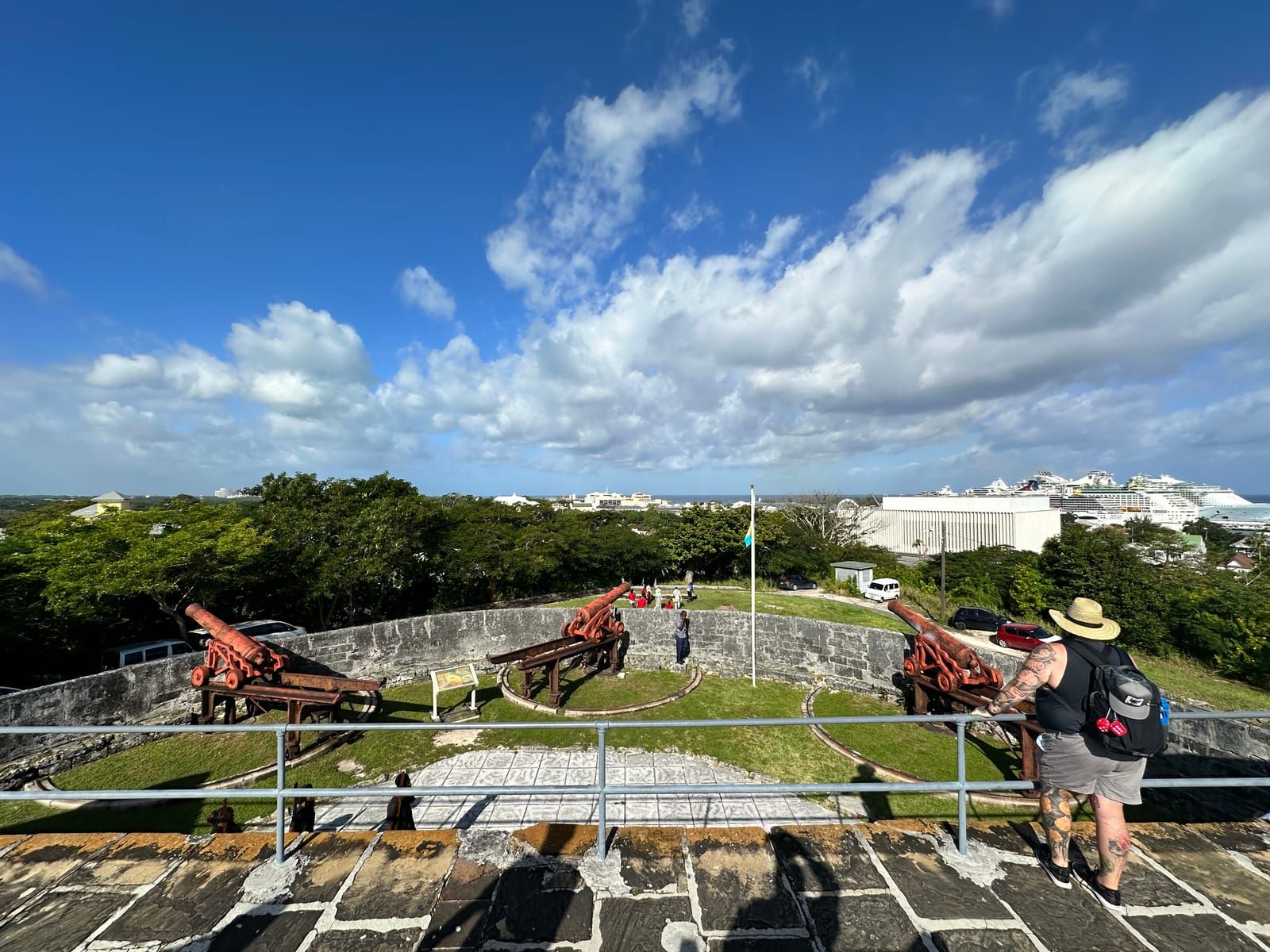 Photo from the top of Fort Fincastle. Red cannons are in the near foreground. Cruise ships at port are in the medium distance.