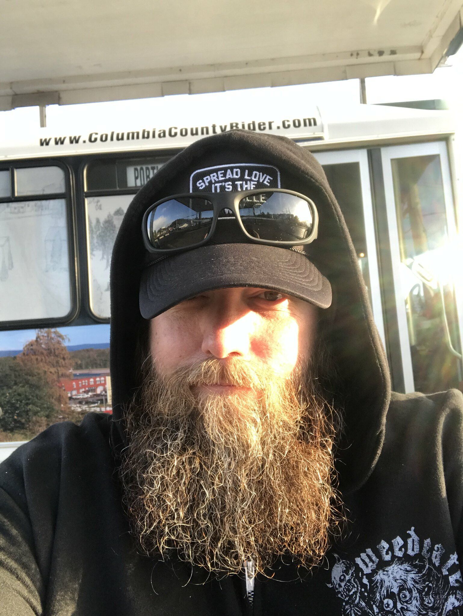 A selfie of Mike wearing a hoodie with the hood up.