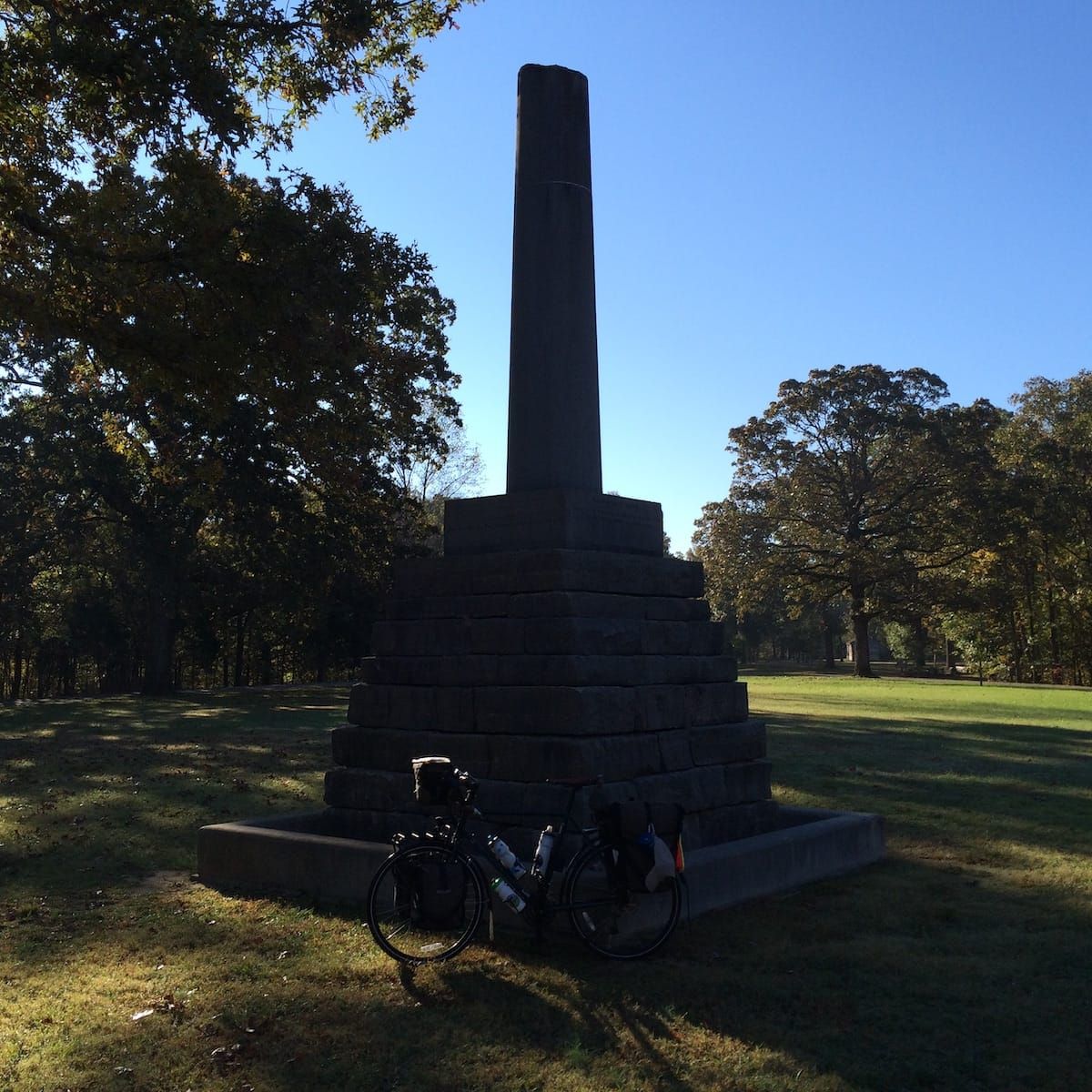 Loaded touring bicycle propped in front of the Meriwether-Lewis monument.