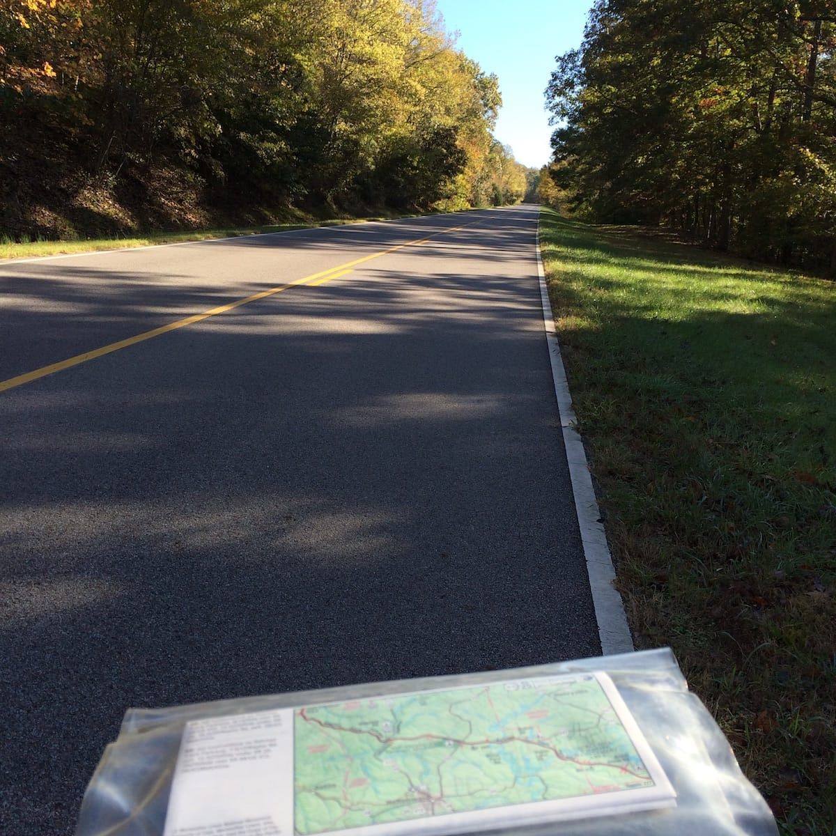 Roadside photo of the road pitching steeply into the distance.