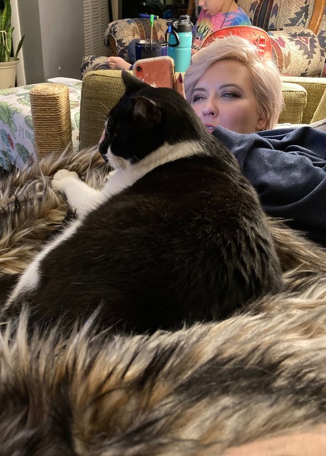 Photo of Oliver laying on Rachelle